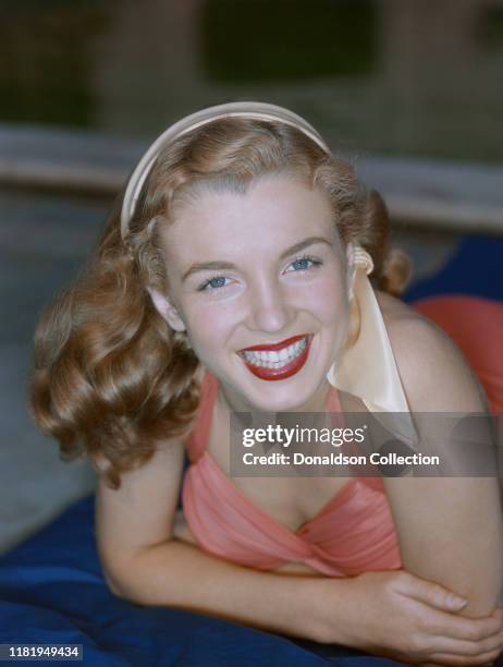 Actress Marilyn Monroe then known as Norma Jeane Mortenson poses for a portrait in 1946 in Los Angeles, California.