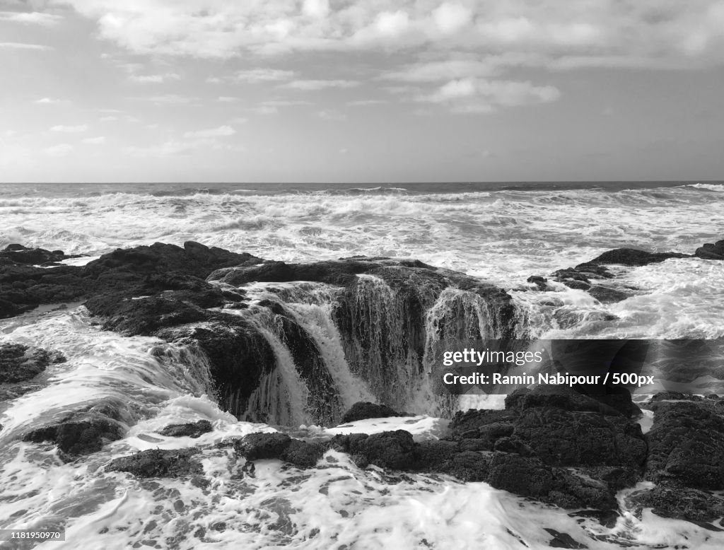 View of ocean and waterfall