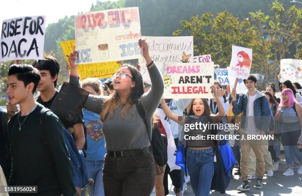 Students and supporters of DACA rally in downtown Los Angeles, California on November 12, 2019 as the US Supreme Court hears arguments to make a...