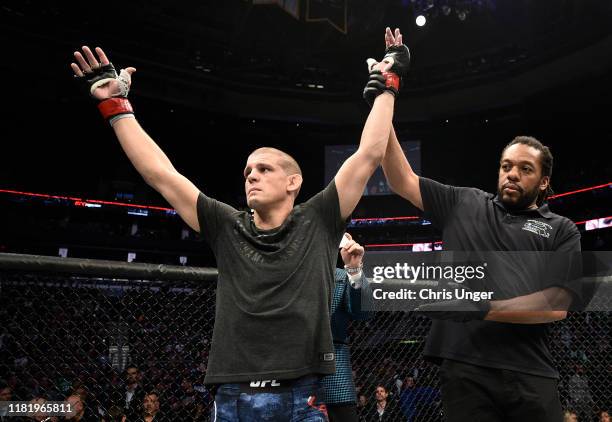 Joe Lauzon reacts after his TKO victory over Jonathan Pearce in their lightweight bout during the UFC Fight Night event at TD Garden on October 18,...