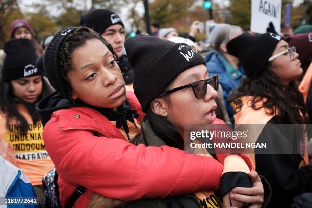 Immigration rights activists take part in a rally in front of the US Supreme Court in Washington, DC on November 12, 2019. - The US Supreme Court...