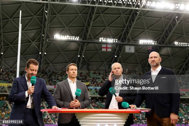 Presenter Mark Pougatch and pundits Jonny Wilkinson, Sir Clive Woodward and Lawrence Dallaglio look on prior to the Rugby World Cup 2019 Quarter...