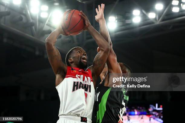 Aaron Brooks of the Hawks ddrives to the basket during the round three NBL match between the South East Melbourne Phoenix and the Illawarra Hawks on...