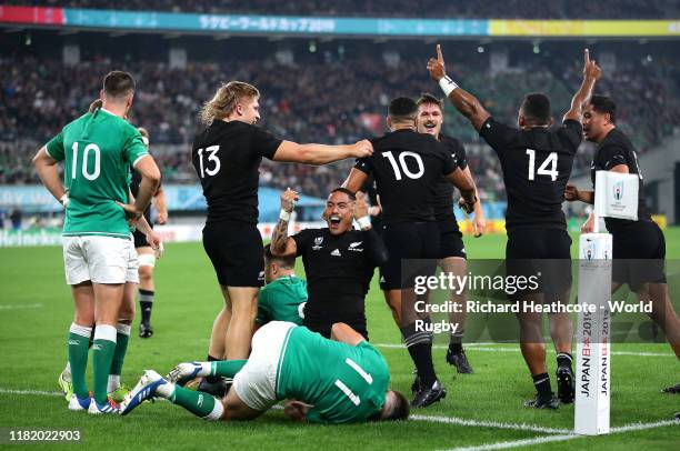 Aaron Smith of New Zealand celebrates after scoring his team's second try during the Rugby World Cup 2019 Quarter Final match between New Zealand and...