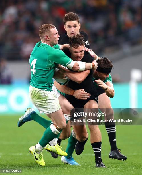 George Bridge of New Zealand is tackled by Keith Earls and Garry Ringrose of Ireland during the Rugby World Cup 2019 Quarter Final match between New...