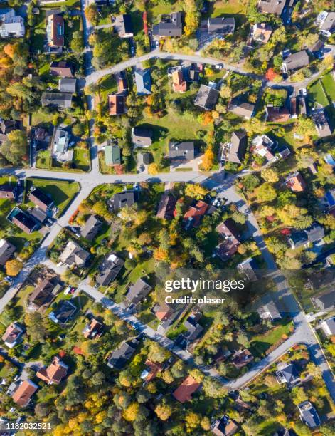 top view, flying over villa area - aerial view neighborhood stock pictures, royalty-free photos & images