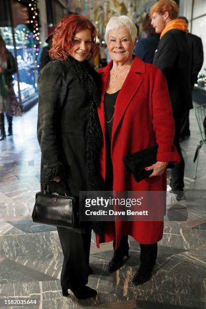 Finty Williams and Dame Judi Dench attend the launch of the 200th Burlington Christmas at Burlington Arcade on November 12, 2019 in London, England.