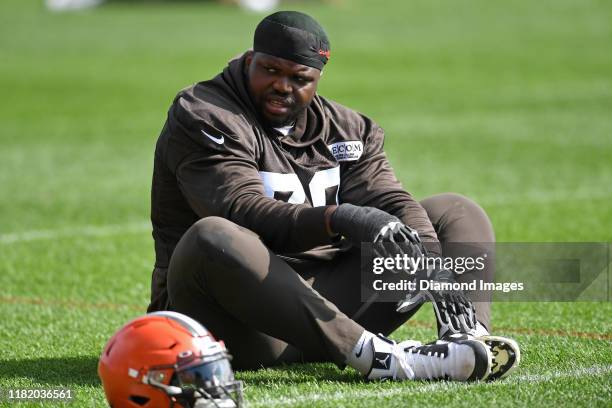 Offensive tackle Greg Robinson of the Cleveland Browns stretches during a practice on September 6, 2019 at the Cleveland Browns training facility in...