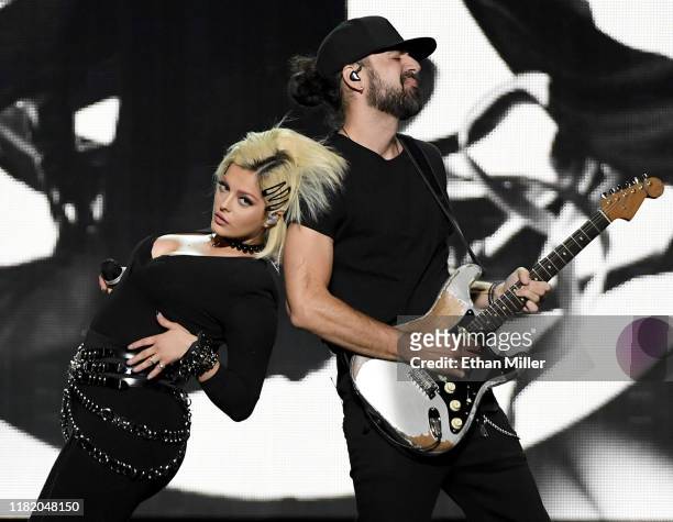 Recording artist Bebe Rexha performs with guitarist Everett Gray as they open for Jonas Brothers during a stop of the group's Happiness Begins Tour...