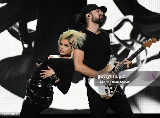 Recording artist Bebe Rexha performs with guitarist Everett Gray as they open for Jonas Brothers during a stop of the group's Happiness Begins Tour...