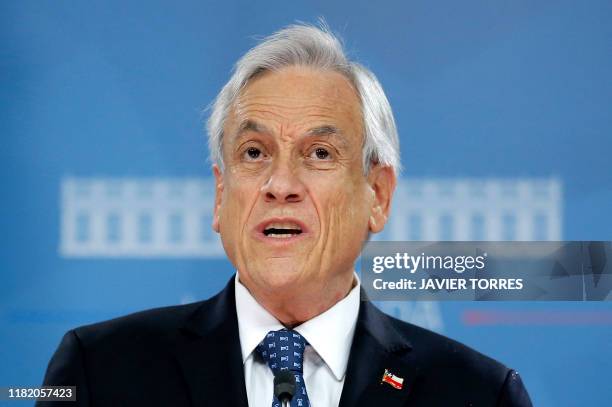 Chilean President Sebastian Pinera addresses the nation in Santiago, on November 12, 2019. - Violent protests broke out in Chile's capital Santiago...