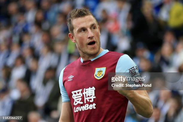 Chris Wood of Burnley celebrates after scoring his team's first goal during the Premier League match between Leicester City and Burnley FC at The...