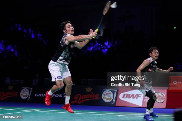 Keigo Sonoda and Takeshi Kamura of Japan compete in the Men's Doubles semi finals match against Hendra Setiawan and Mohammad Ahsan of Indonesia on...