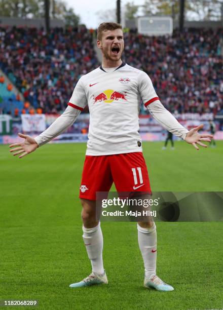 Timo Werner of RB Leipzig celebrates after scoring his team's first goal during the Bundesliga match between RB Leipzig and VfL Wolfsburg at Red Bull...