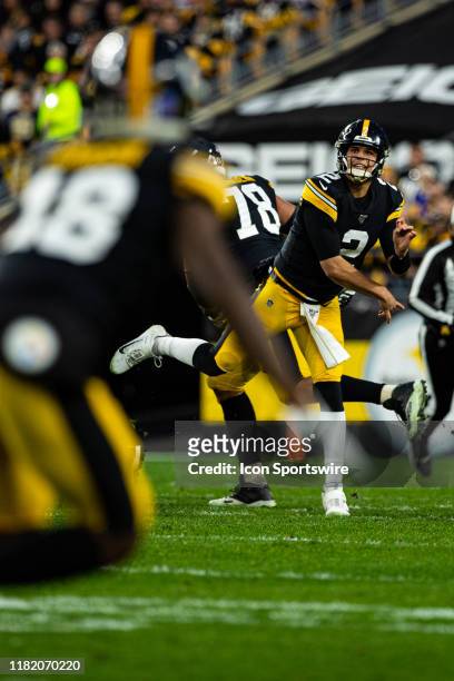 Pittsburgh Steelers quarterback Mason Rudolph throws a pass to Pittsburgh Steelers wide receiver Diontae Johnson during the NFL football game between...