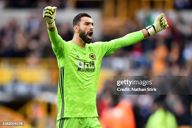 Rui Patricio of Wolverhampton Wanderers celebrates his team's first goal during the Premier League match between Wolverhampton Wanderers and...