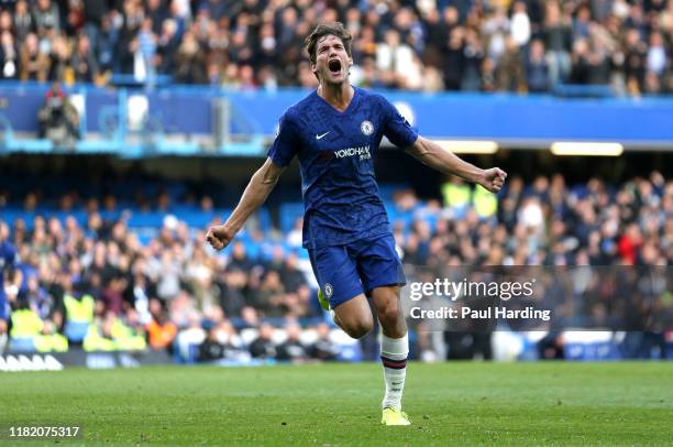 Marcos Alonso of Chelsea celebrates after scoring his team's first goal during the Premier League match between Chelsea FC and Newcastle United at...