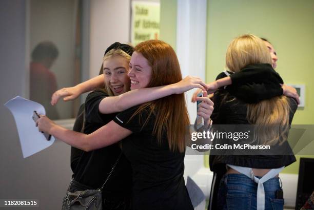 Pupils from King David High School in Liverpool receiving their GCSE exam results. Around 90 pupils gathered at the school where the results were...