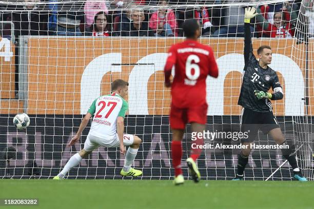 Alfred Finnbogason of FC Augsburg scores his team's second goal during the Bundesliga match between FC Augsburg and FC Bayern Muenchen at WWK-Arena...