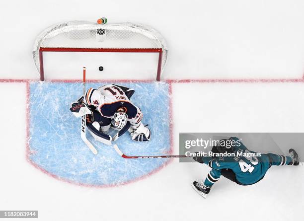 An overhead view as Tomas Hertl of the San Jose Sharks scores a goal against Mike Smith of the Edmonton Oilers at SAP Center on November 12, 2019 in...