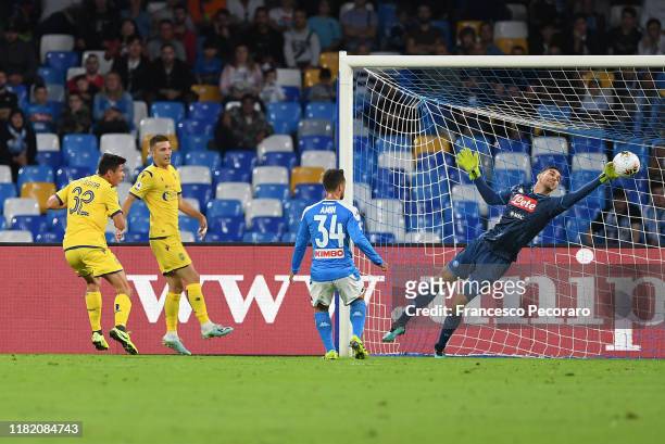 Alex Meret of SSC Napoli saves on Matteo Pessina of Hellas Verona during the Serie A match between SSC Napoli and Hellas Verona at Stadio San Paolo...
