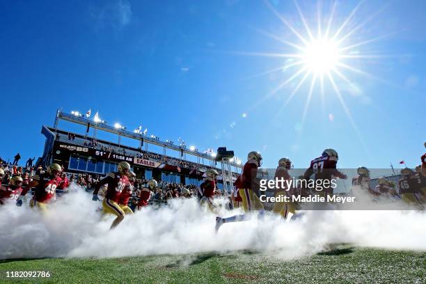 The Boston College Eagles take the field before their game against the North Carolina State Wolfpack at Alumni Stadium on October 19, 2019 in...