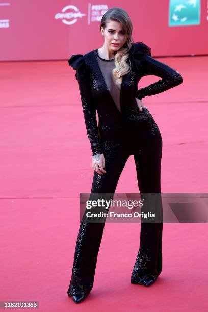 Ginevra Lambruschi walks a red carpet during the 14th Rome Film Festival on October 19, 2019 in Rome, Italy.