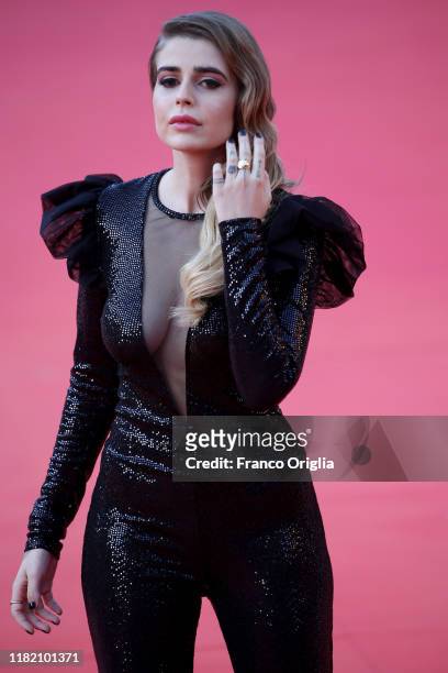 Ginevra Lambruschi walks a red carpet during the 14th Rome Film Festival on October 19, 2019 in Rome, Italy.