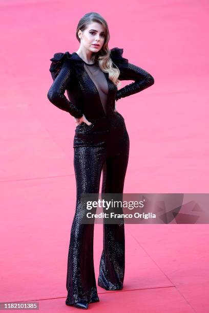 Ginevra Lambruschi walks a red carpet during the 14th Rome Film Festival on October 19, 2019 in Rome, Italy.