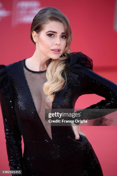 Ginevra Lambruschi walks a red carpet during the 14th Rome Film Festival on October 19, 2019 in Rome, Italy.