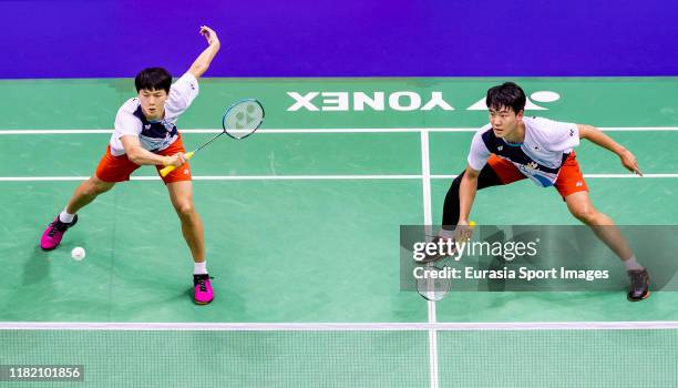 Kang Min Hyuk and Kim Jae Hwan of South Korea in action during the men's doubles against Ong Yew Sin and Teo Ee Yi of Malaysia on day two of the...