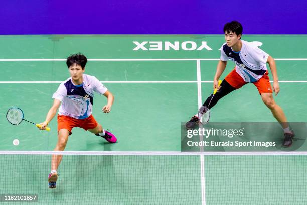 Kang Min Hyuk and Kim Jae Hwan of South Korea in action during the men's doubles against Ong Yew Sin and Teo Ee Yi of Malaysia on day two of the...