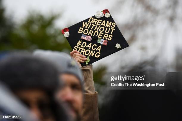 Demonstrators gather in front of the United States Supreme Court, where the Court is hearing arguments on Deferred Action for Childhood Arrivals -...