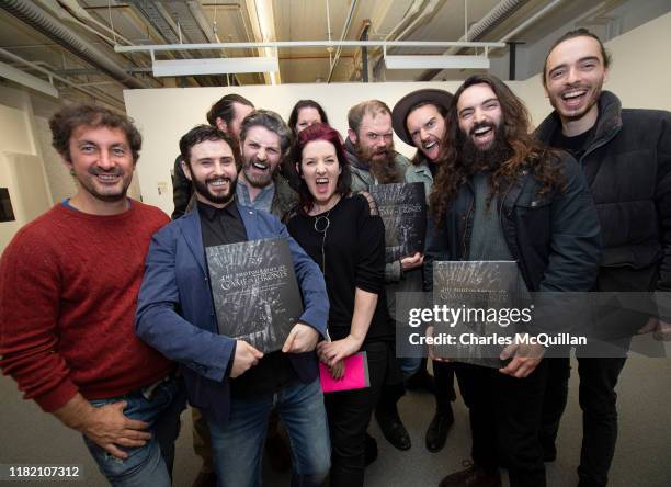 Game of Thrones photographer Helen Sloan is pictured alongside local extras from the hit television series at the Photography of Game of Thrones book...