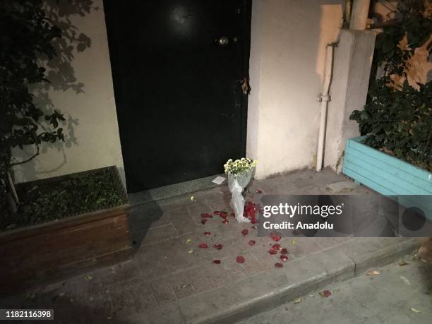 Note and a bouquet of flowers are left at a door step after former British military intelligence officer James Gustaf Edward Le Mesurier was found...