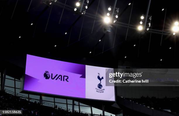 Is displayed on the screen next to the Tottenham Club badge ahead of the Premier League match between Tottenham Hotspur and Watford FC at Tottenham...