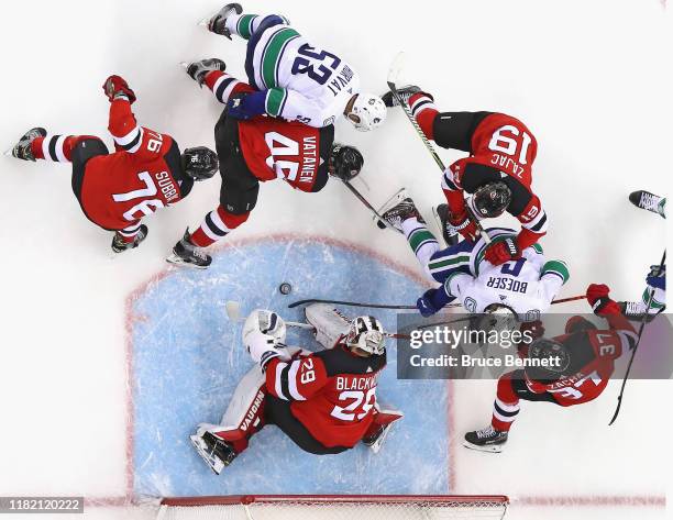 Mackenzie Blackwood of the New Jersey Devils makes the second period save against the Vancouver Canucks en route to a 1-0 shutout at the Prudential...