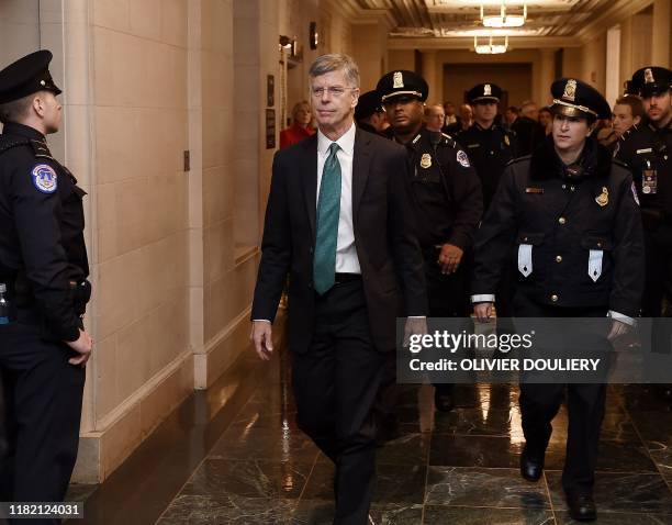 Bill Taylor, the top diplomat in the US embassy in Ukraine arrives to testify before the House Intelligence Committee for the first public...