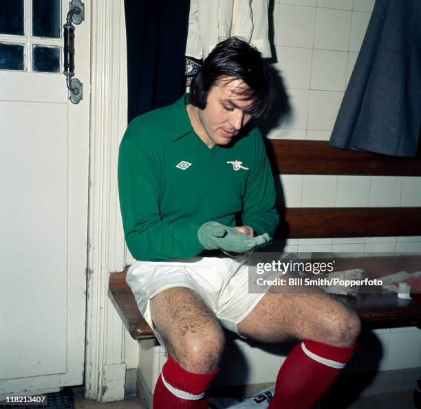 Jimmy Rimmer Today Arsenal goalkeeper Jimmy Rimmer preparing in the dressing room at ...