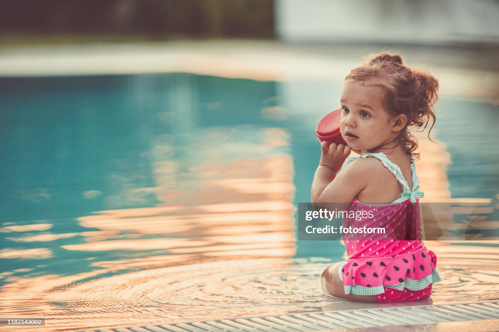 Playing on the poolside