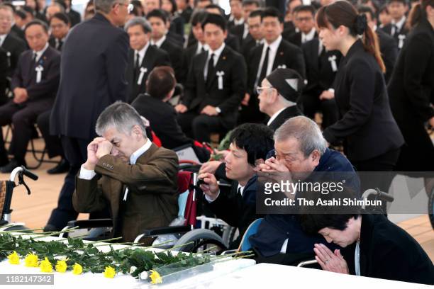 Minamata Disease patients pray for the victims during the ceremony marking the 63rd anniversary of the official recognition of the Minamata Disease...