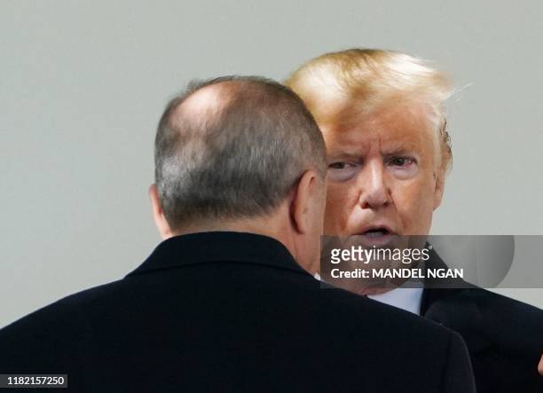 President Donald Trump chats with Turkey's President Recep Tayyip Erdogan in the Colonnade before a meeting in the Oval Office of the White House in...