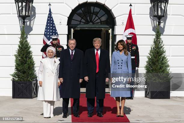 Recep Tayyip Erdogan, Turkey's president, second left, his wife Emine Erdogan, left, U.S. President Donald Trump, and First Lady Melania Trump,...