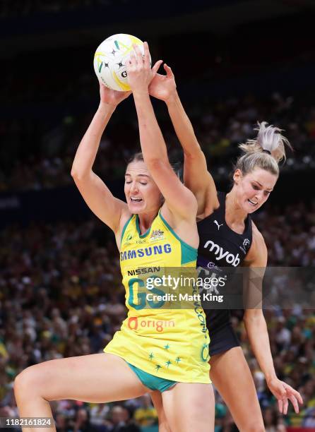 Caitlin Bassett of Australia is challenged by Jane Watson of New Zealand during the 2019 Constellation Cup match between the Australian Diamonds and...