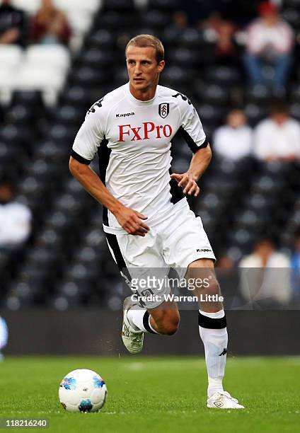 Brede Hangeland of Fulham during the UEFA Europa League qualifying match between Fulham and NSI Runavik at Craven Cottage on June 30, 2011 in London,...