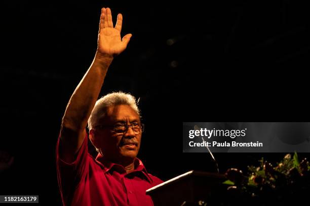 Presidential candidate Gotabaya Rajapaksa with the Sinhalese-Buddhist nationalist party on stage during the last political rally before heading to...
