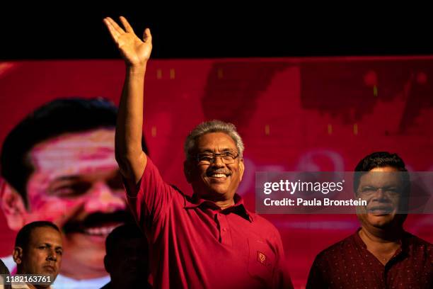 Presidential candidate Gotabaya Rajapaksa with the Sinhalese-Buddhist nationalist party on stage during the last political rally before heading to...