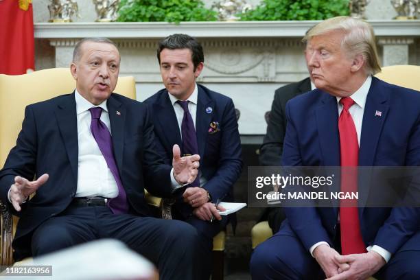 President Donald Trump and Turkey's President Recep Tayyip Erdo?an take part in a meeting in the Oval Office of the White House in Washington, DC on...