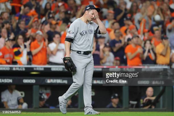 Zack Britton of the New York Yankees reacts against the Houston Astros during the eighth inning in game six of the American League Championship...