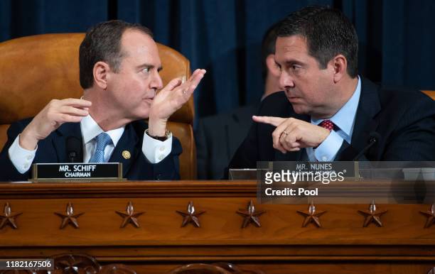 House Intelligence Committee Chairman Adam Schiff and ranking member of the House Intelligence Committee Devin Nunes talk during the first public...